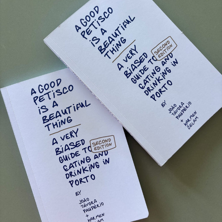 Two books titled 'A Good Petisco is a Beautiful Thing' on a green background